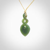 Hand carved New Zealand jade twist pendant. Carved in New Zealand by NZ Pacific. Unique double twist jewellery for sale online. Provided with an adjustable cord.